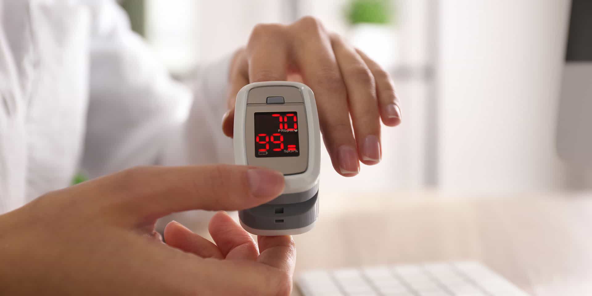 Oximeter in use